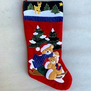 Red velvet Christmas stocking with bear details